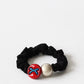 Bow Dog Charm Hair Ties showing multiple available variants