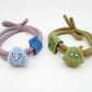 Monster Charm Hair Tie Collection showing multiple available variants