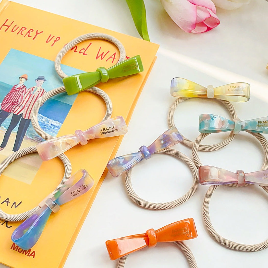 Marbled Bow Hair Tie Collection showing multiple available variants