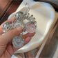 Gifty - Smiley Face Bow Spiral Plastic Hair Tie
