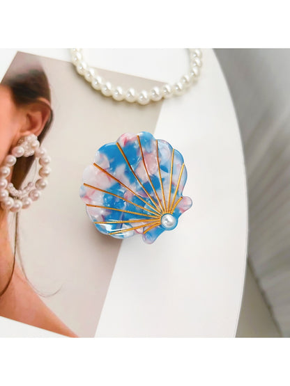 Beau hair claw clip shown from top angle highlighting shell pattern