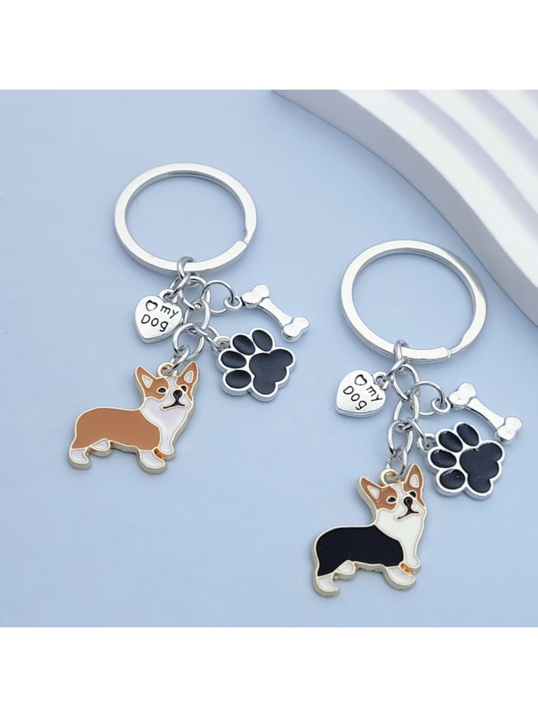 Close-up of puppy paw-shaped keychain showing textured paw pads