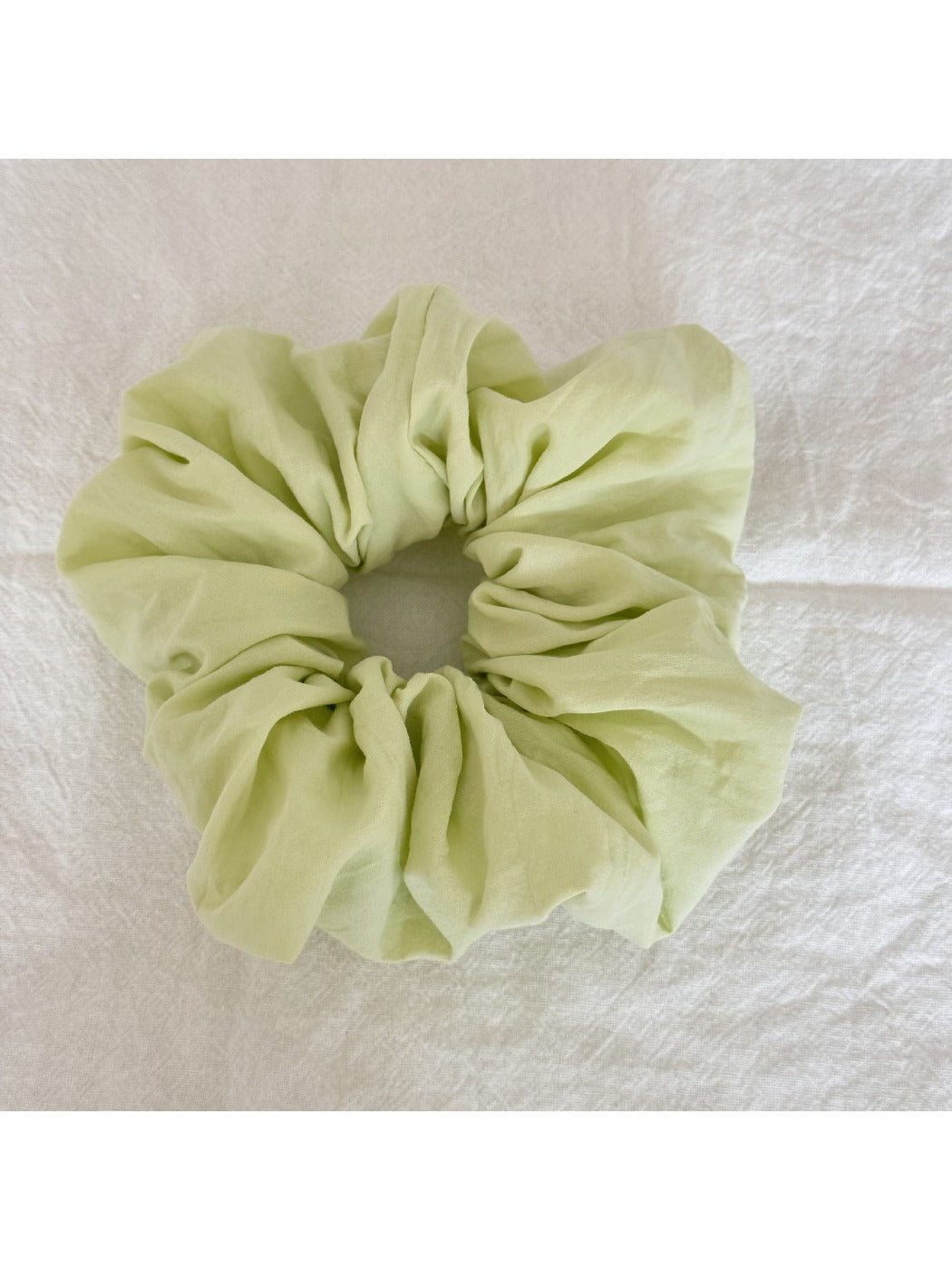 Gifty Sweet Green Style Scrunchie displayed on a white background