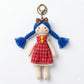 Fabric yarn doll keychain with multicolored yarn hair and traditional outfit details