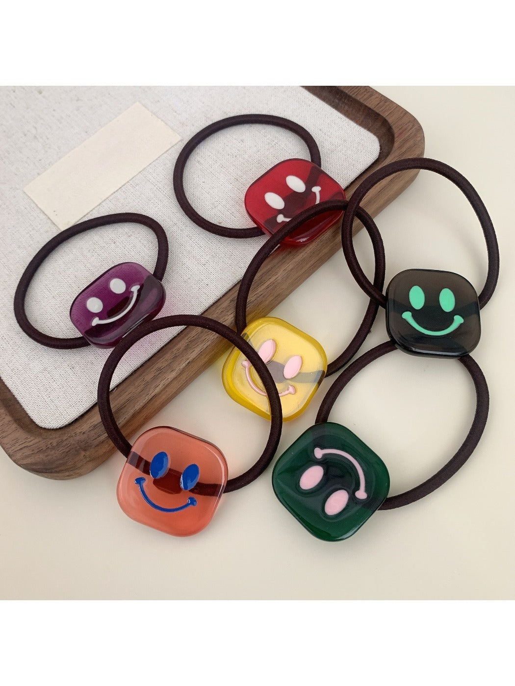 Gifty - Block Smiley Face Hair Tie