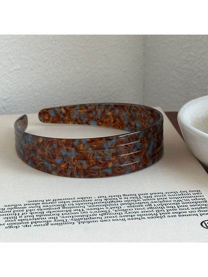 Gifty vintage textured headband displayed on a white background