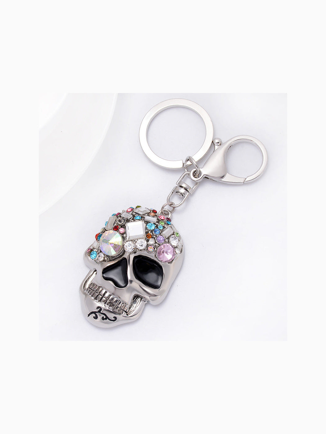 Silver-tone multicolor faceted skull keychain