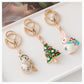 Christmas tree, snowman, stocking and rabbit keychains
