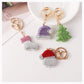 Christmas tree, hat, stocking and Santa face keychains