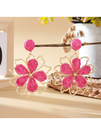 Earedge flower shaped drop earrings styled with a matching necklace