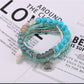 Multiple Lovra stackable beaded bracelets arranged in a circle