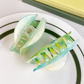 Green marbled geometric hair claws - two-variant construction view