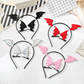 Halloween bat wing hair clip and headband styled overview