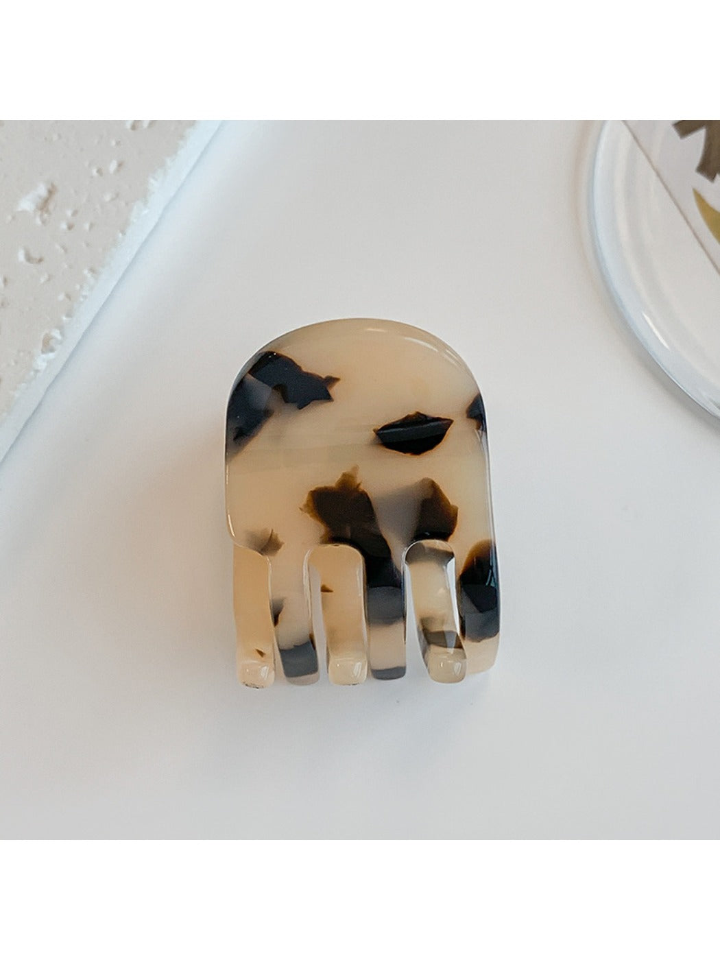 Beau acetate hair clip open to display metal clasp and hinge details