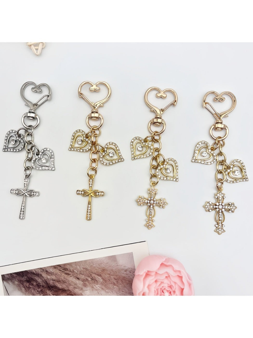Vintage cross pendant keychain with intricate metalwork on a keyring