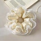 Gifty scrunchie displayed on a white background showing full circular shape