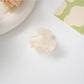 Top view of Beau hair clip emphasizing symmetrical retro design