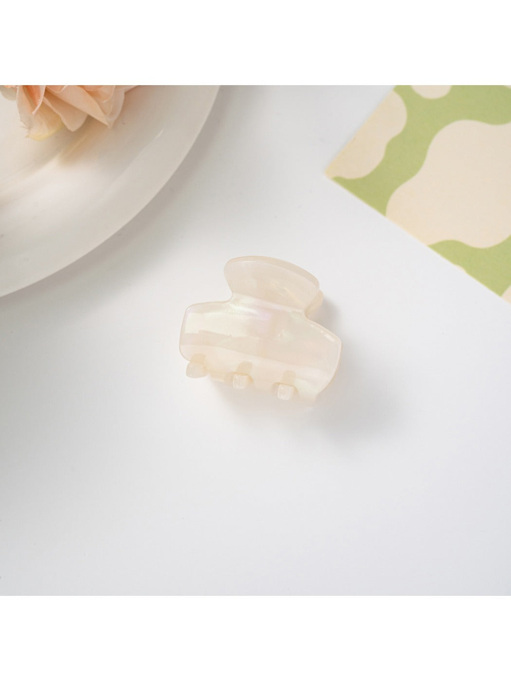Top view of Beau hair clip emphasizing symmetrical retro design