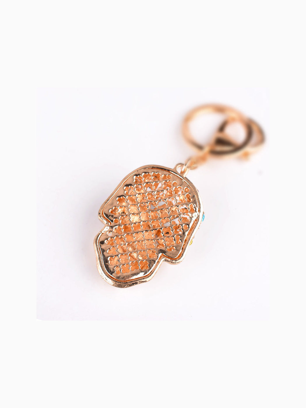 Gold-tone skull keychain back view