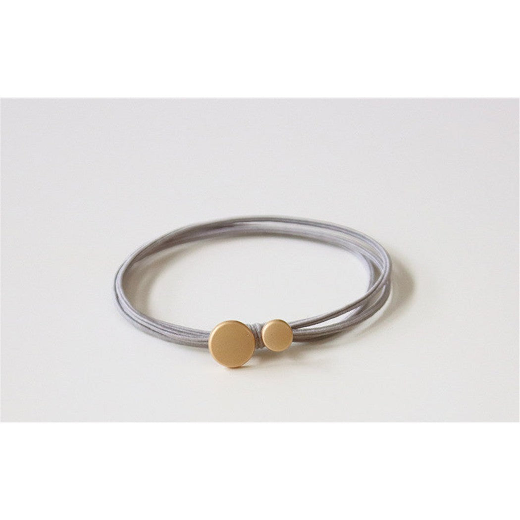 Gray round geometric-bead hair tie