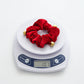 Burgundy Christmas bell scrunchie weighing 10.7 g