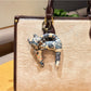 Keypus cartoon cat charm keychain displayed on a white background highlighting its design