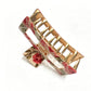 Close-up of Beau flower pattern hair clip showing detailed floral design