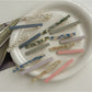 Beau acetate straight bar hair clip in tortoiseshell pattern on white background