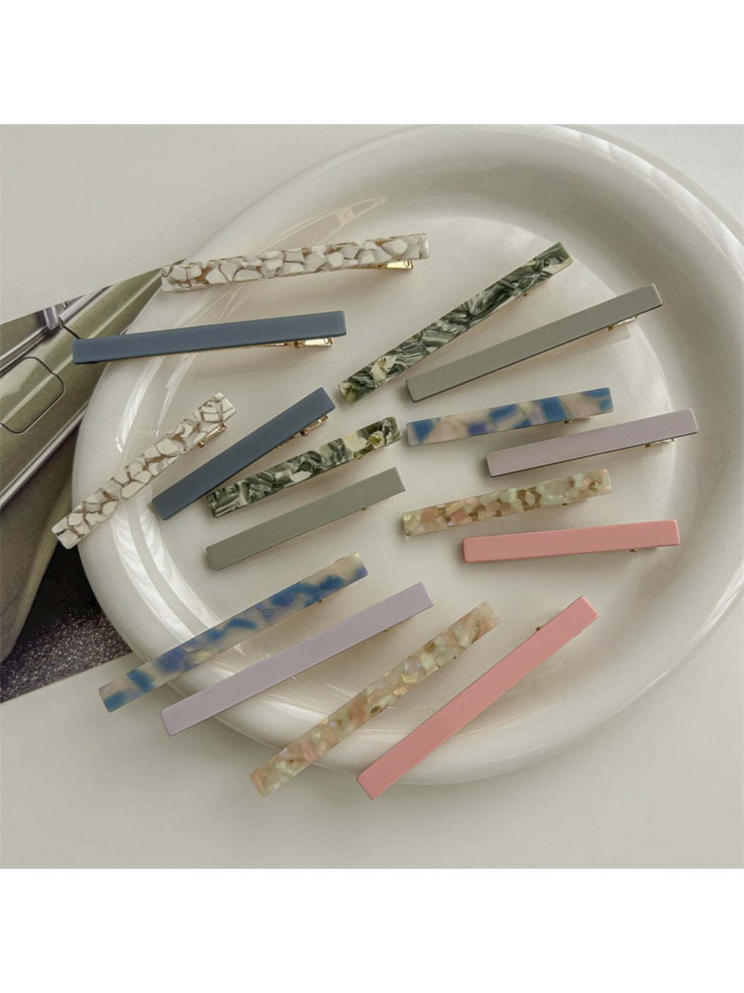 Beau acetate straight bar hair clip in tortoiseshell pattern on white background