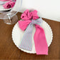 Magenta striped scrunchie packaged for retail display