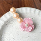 Beau Camellia beaded hair clip displayed with packaging box