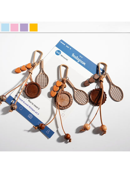 Keypus - Dark Colored Racket Shaped Keychain