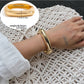 Lovra minimalist modern irregular bangle bracelet with soft lighting