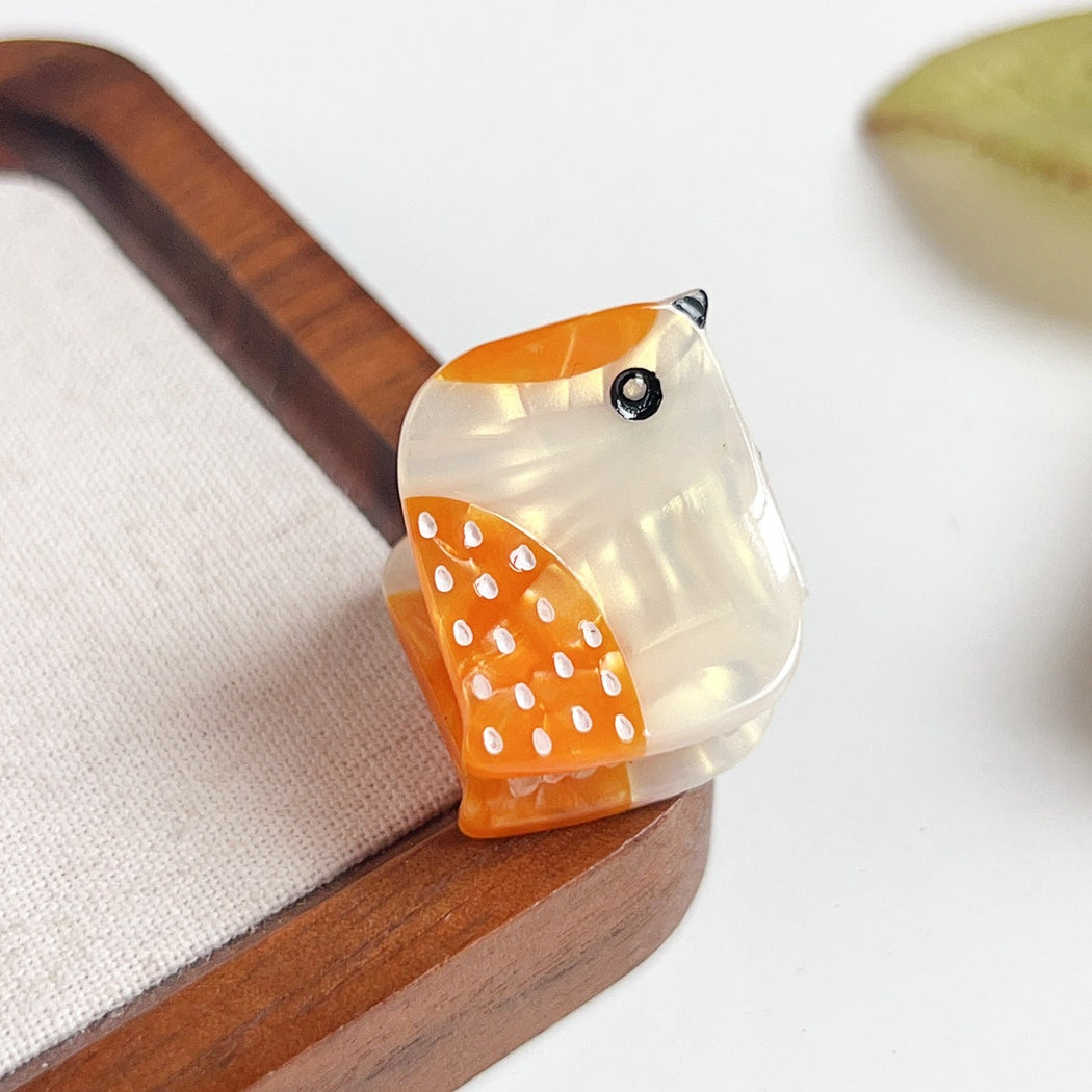 Yellow freckled bird hair claw clip