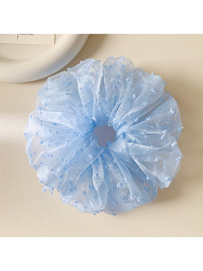 Gifty solid color polka dot scrunchie displayed flat to show full pattern and design