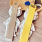 Top view of Keypus fabric patchwork keychain highlighting colorful fabric patterns