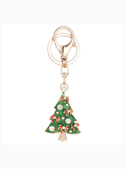Green Christmas tree keychain on white background