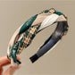 Model wearing Gifty fabric woven twist headband with loose hair