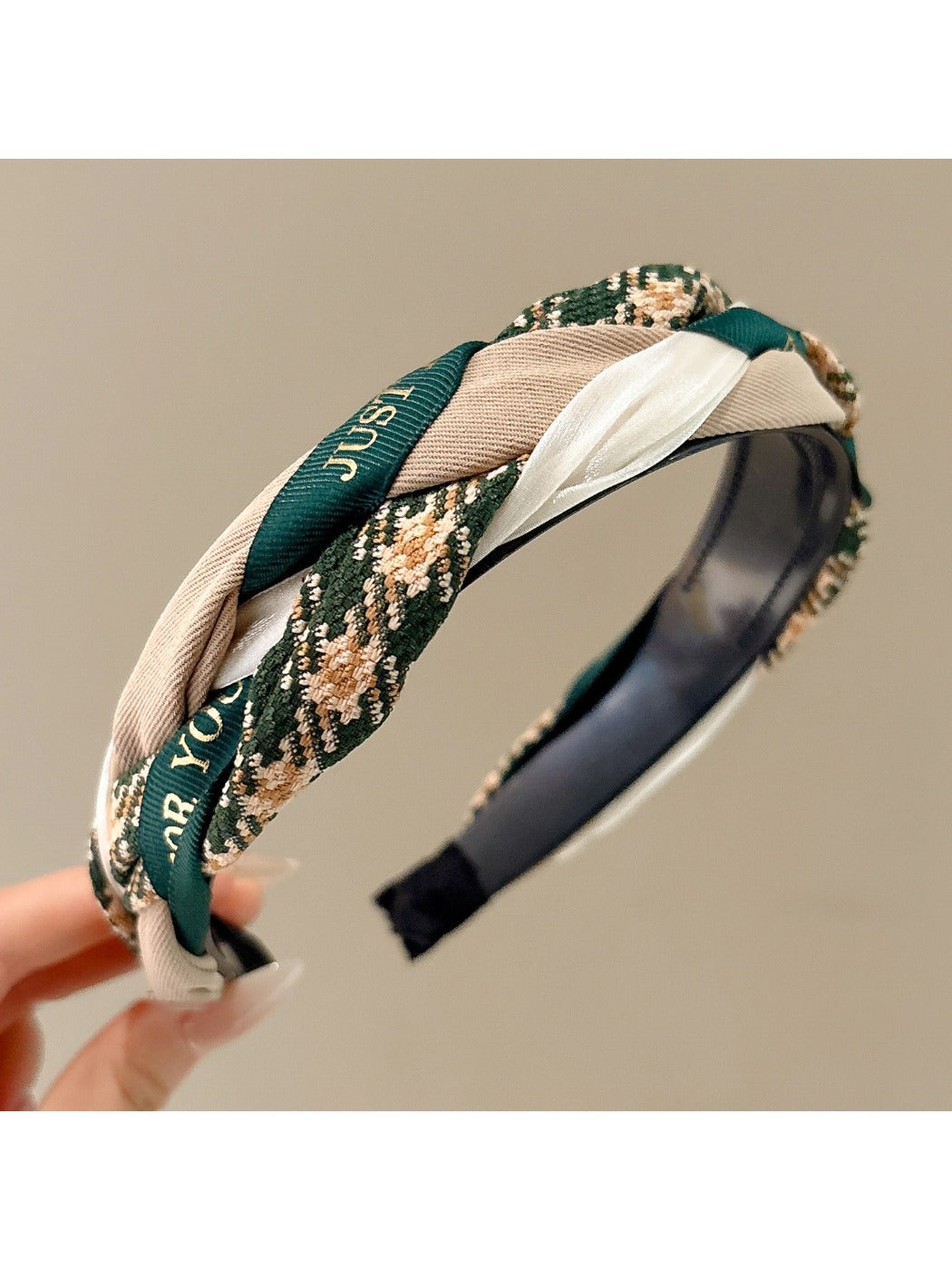 Model wearing Gifty fabric woven twist headband with loose hair