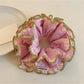 Close-up of pink lace trim detail on double scrunchie