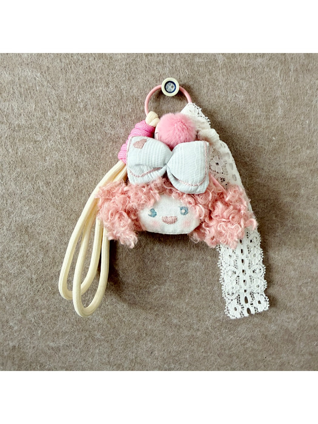 Keypus double ponytail fabric doll keychain displayed on a white background