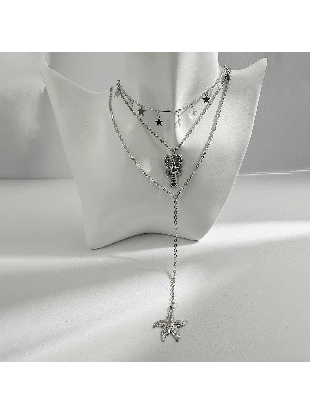 Nozari - Retro Distressed Ocean Charm Layered Necklace