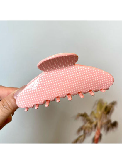 Beau polka dot acetate claw clip open showing metal spring mechanism