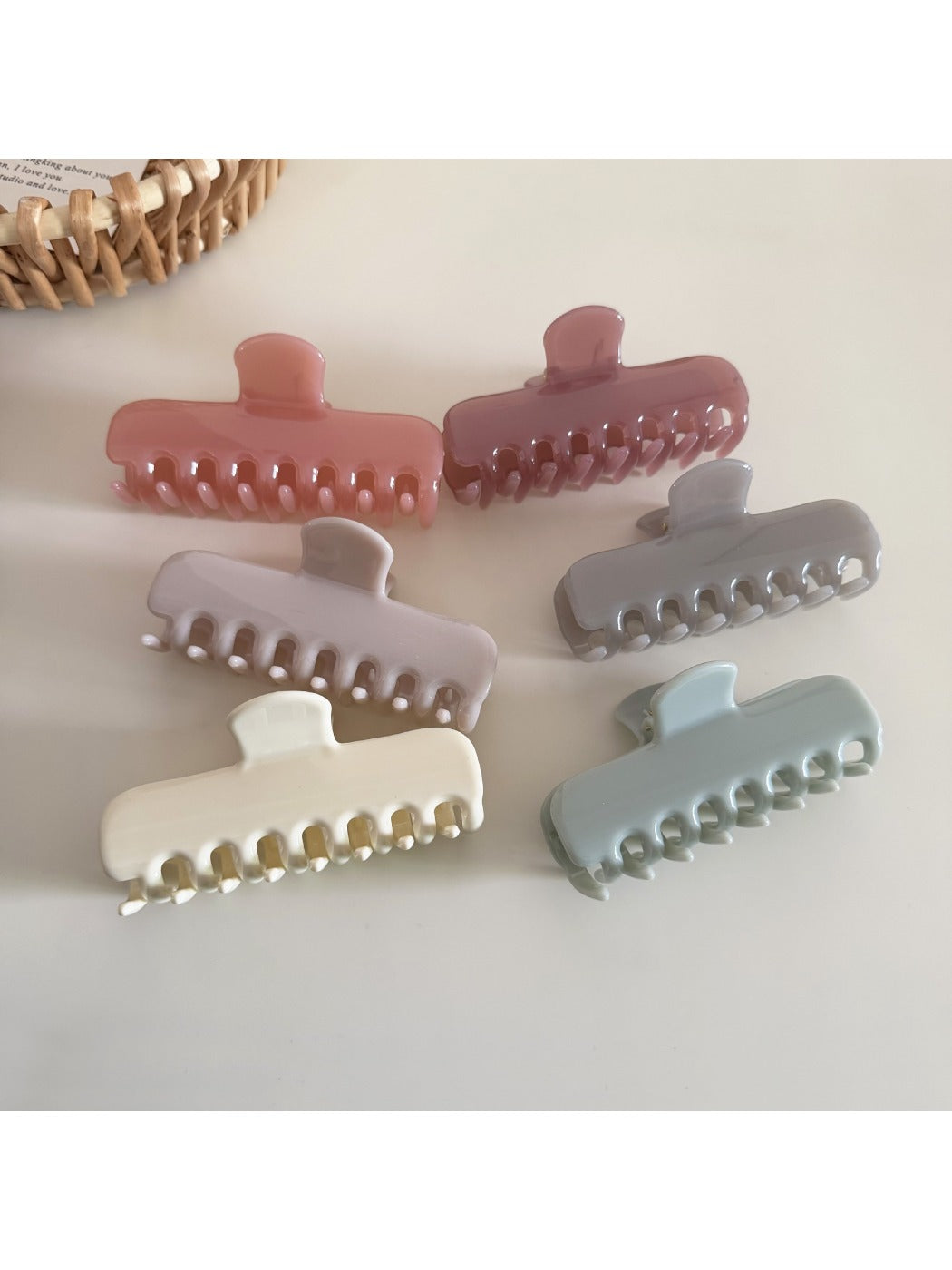 Side view of Beau rectangular hair clip in pastel blue with metal clasp