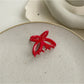 Top view of Beau butterfly claw clip showing symmetrical butterfly wing shape