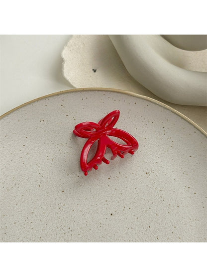 Top view of Beau butterfly claw clip showing symmetrical butterfly wing shape