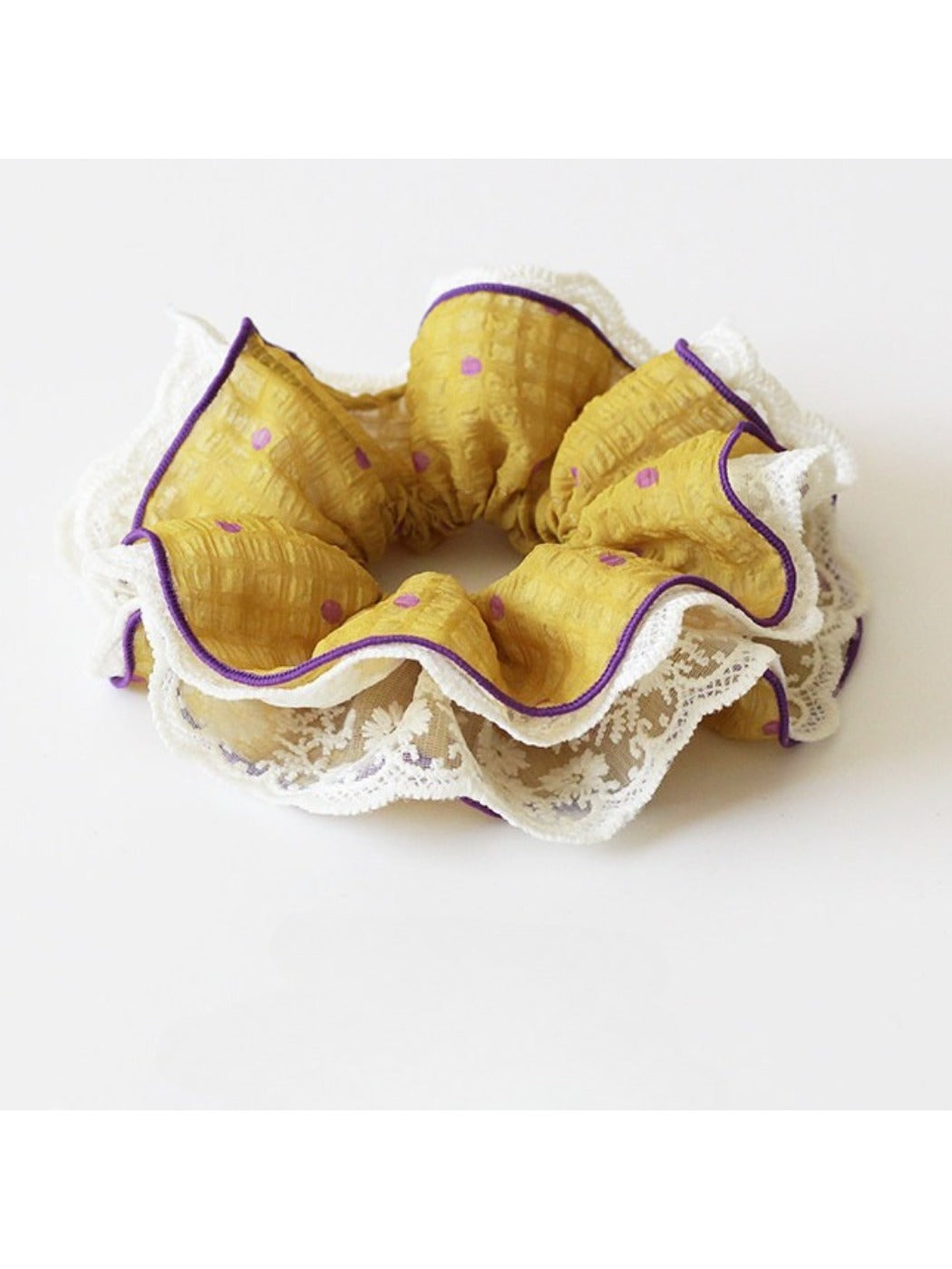 Side view of Gifty ruffled scrunchie highlighting fabric layers