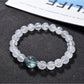 Close-up of clear quartz beads on Lovra minimalist beaded bracelet