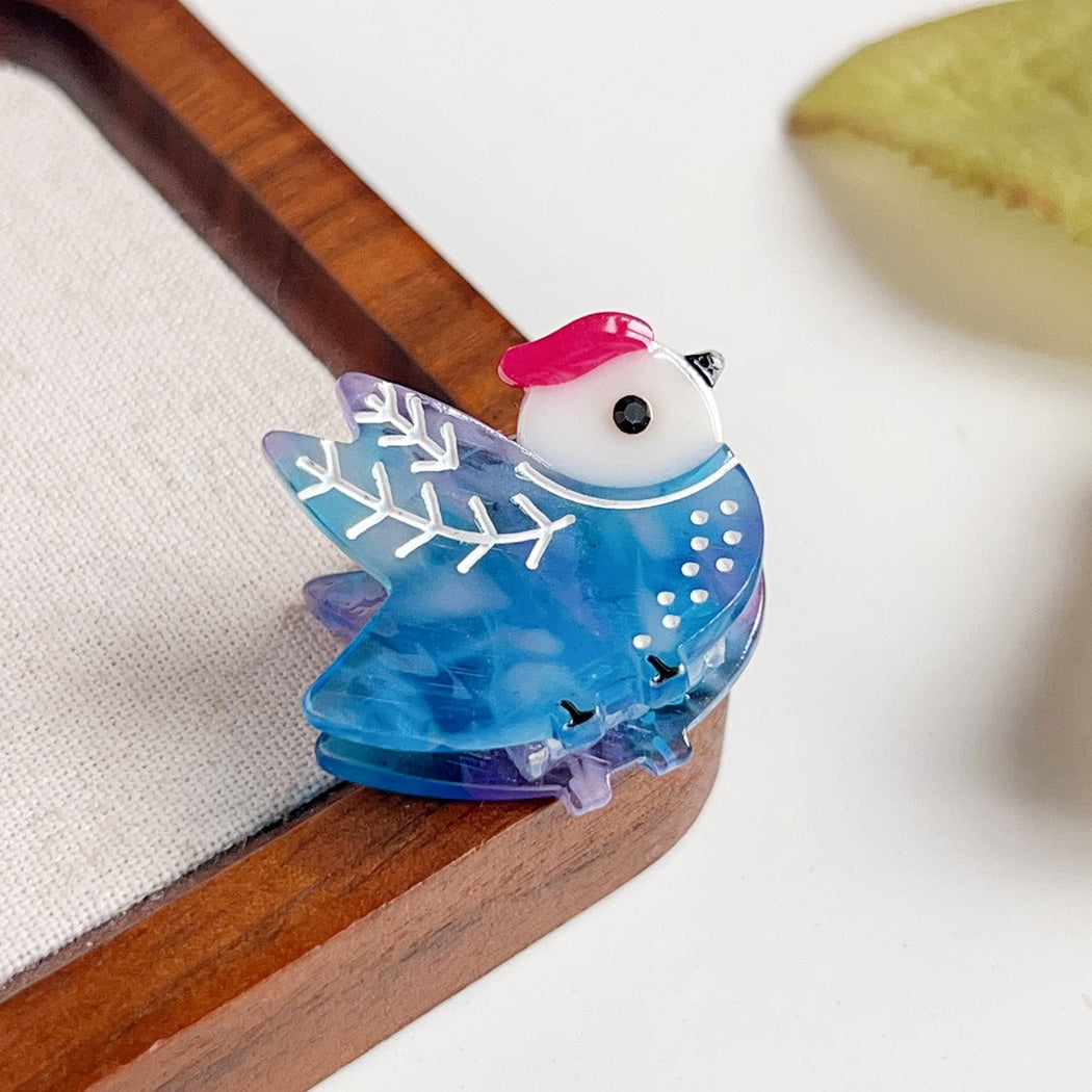 Blue winged bird hair claw clip