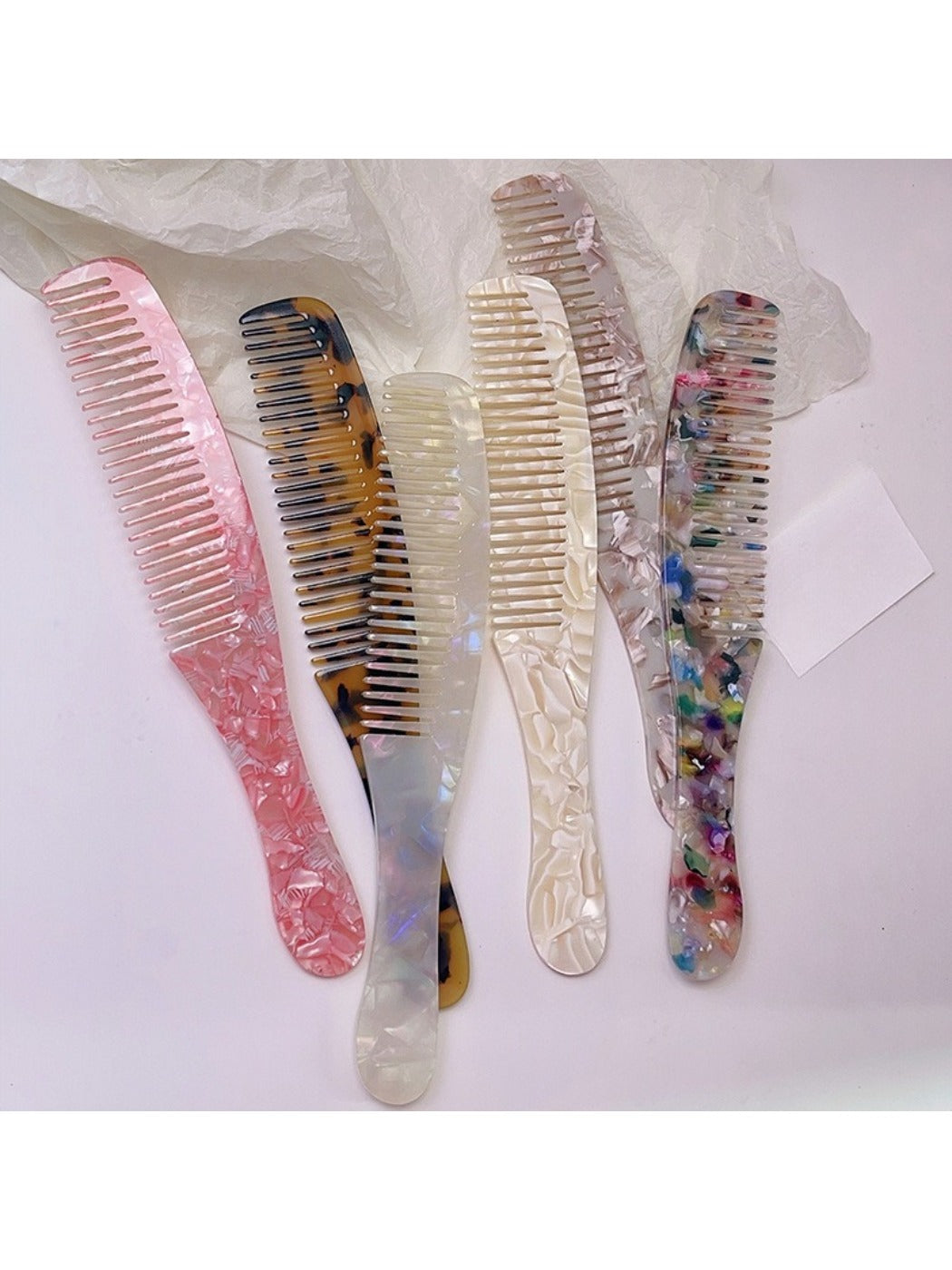 Close-up of Camerow long handle hair comb showing smooth teeth and handle
